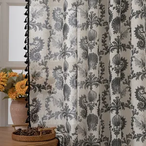 Vintage coastal seahorse and seashell printed linen curtain with elegant black tassel trim.