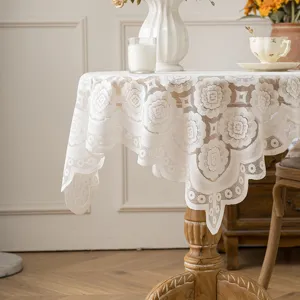 Weiße Spitzen-Tischdecke im französischen Stil, runder Tischbezug, hohler dekorativer Essstoff.
