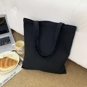 Klassische schwarze Canvas Tragetasche fuer den Alltag, umweltfreundliche Shopper.