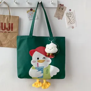 Green canvas tote bag featuring cute duck print, 3D feet and plush cloud pendant accessory.