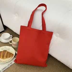 Einfache rote Stofftasche aus Segeltuch für den Alltag, praktische wiederverwendbare Tasche.