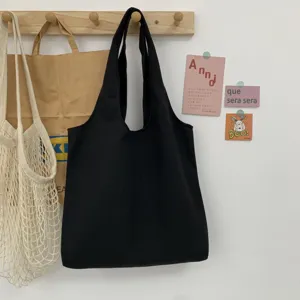 Einfarbige schwarze Canvas Tragetasche schlichte Schultertasche fuer Studenten Alltag