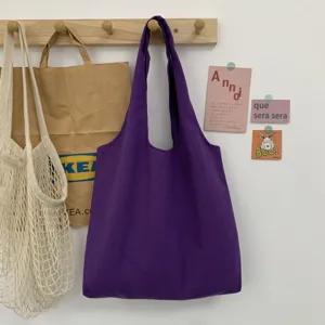 Einfarbige lila Canvas Tragetasche, lässige minimalistische Umhängetasche für Damen.