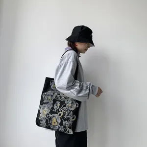 Black canvas shoulder bag for women, Japanese ulzzang style daily tote with artistic bear print.
