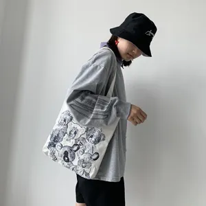 Canvas tote bag with cute sketch bear graphic print, Japanese Harajuku style casual shoulder bag.
