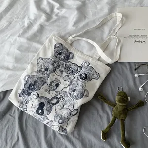 Japanese Harajuku style canvas tote bag featuring vintage bear sketch print, casual and stylish.