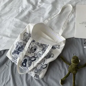 Vintage bear print canvas tote bag for women, casual shoulder bag for daily student travel.