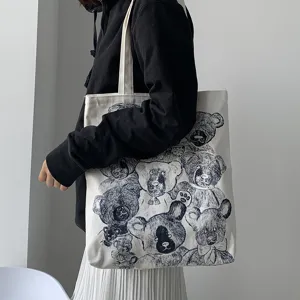 Close-up detail of casual canvas shoulder bag featuring vintage cute teddy bear prints design.