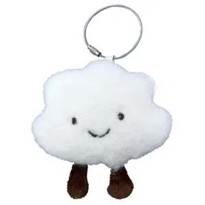Cute white cloud plush bag charm with brown legs, fluffy keychain and backpack pendant accessory.