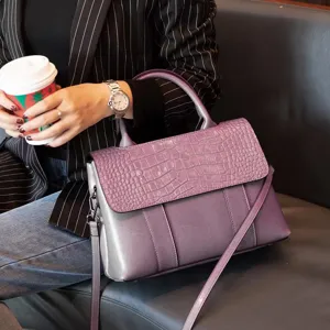 Genuine leather retro style women handbag detail view, crocodile embossed flap shoulder bag.