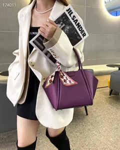 Bolso de mano morado de cuero genuino para mujer, elegante bolso de hombro de gran capacidad.
