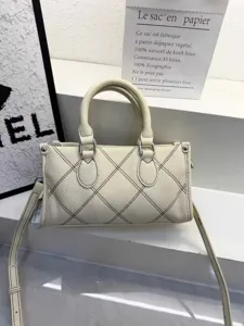 Minimalist quilted pillow shoulder bag for women, stylish casual leather crossbody bag.