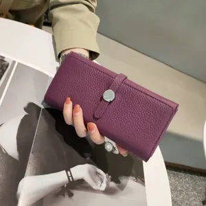 Purple genuine leather long wallet for women, stylish clutch purse with metal closure strap.