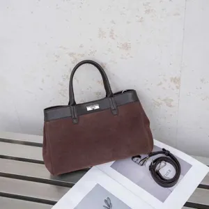 Brown colorblock suede tote bag detail, stylish large capacity shoulder handbag for women.