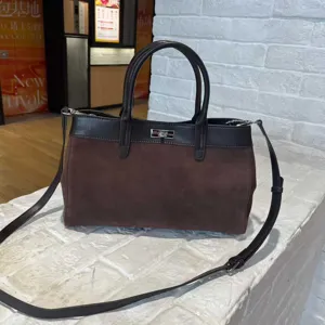 Brown suede tote bag with top handle and shoulder strap, stylish casual handbag for daily use.