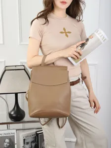 Genuine top layer cowhide solid color backpack, casual student school bag, stylish soft leather daypack.