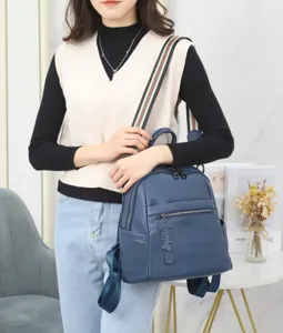 Women's blue leather backpack stylish casual daypack with striped strap for daily use