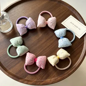 Chouchous nœuds papignon à pois doux coréens pour filles, élastiques à cheveux haute élasticité.