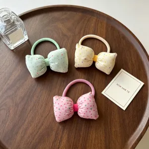 Joli ensemble d'élastiques à cheveux nœud à pois pour enfants et femmes accessoires.