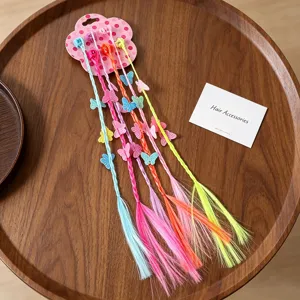 Colorful synthetic hair extensions with cute butterfly clips, perfect for kids hair styling.