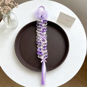 Accessorio per capelli treccia parrucca bambino con sfumatura viola bianco, farfalla e fiocchi.