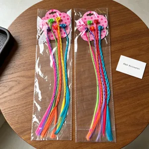 Kids colorful hair extension clips with braided pigtails and small claw clips for party dress.