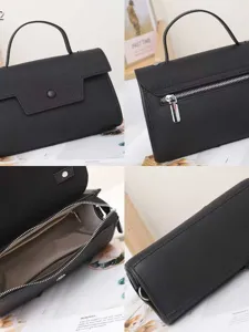 Borsa a tracolla in pelle nera da donna borsa a busta minimalista con manico.