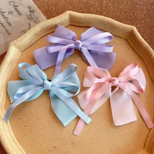 Sweet Korean style ribbon bow hair clip set, elegant pastel hair accessories for women.