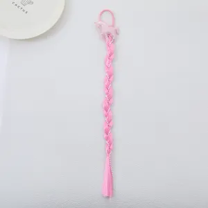 Children pink unicorn hair braid extension detail view, cute braided wig hair ornament.