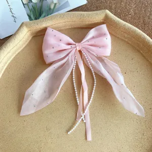 Pink bow hair clip with sparkling rhinestones and pearl tassel ribbons, sweet princess hair accessory.