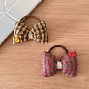 Elastico capelli fiocco in tessuto scozzese stile coreano, accessorio imbottito, dettaglio.