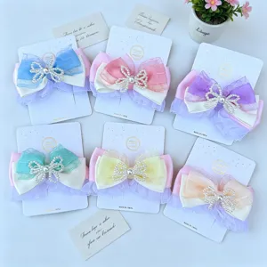 Pinzas para el pelo de lazo con perlas y tul, conjunto multicolor vivo para peinados bonitos.