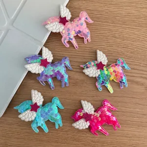 Barrettes licorne à paillettes avec ailes et étoiles, superbes accessoires enfants.