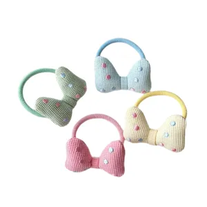 Süße Waffelmuster Schleife Haargummis für kleine Mädchen, 4er Set mit bunten Haarseilen.