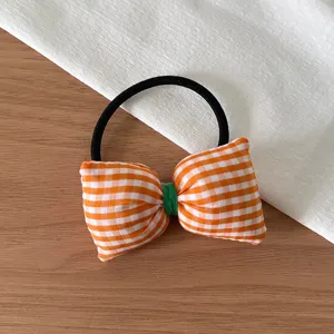 Joli élastique à cheveux nœud vichy orange, accessoire de coiffure en tissu style tendance.