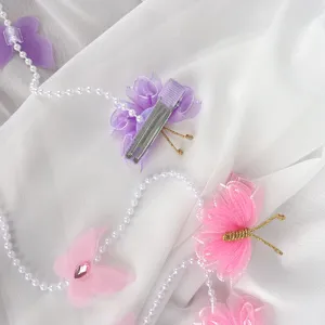 Détail pince à cheveux papillon en résille perle, accessoire de cheveux princesse fée