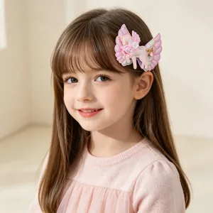 Cute pink unicorn angel wings hair clip detail, perfect for sweet little girls daily wear.