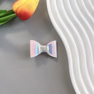 Korean laser glitter handmade bow hair clip detail view, sparkling pink hair accessory for kids.