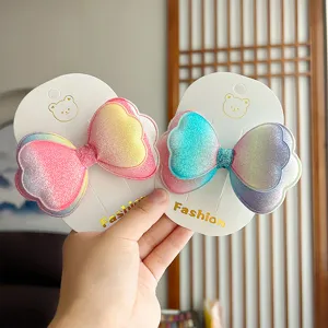 Molletta fiocco sfumato glitter doppio strato bambini accessorio capelli dettaglio vista.
