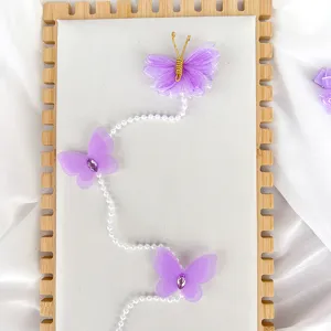 Jolie pince à cheveux papillon en perles pour petites filles, accessoire de coiffure princesse.