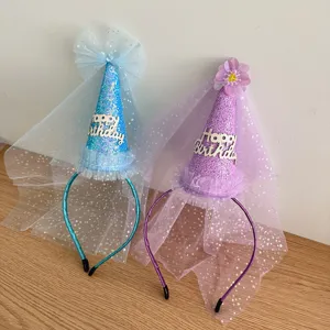 Detail view of kids birthday cone hat headband with mesh veil, party hair accessories.