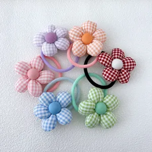 Fabric plaid flower hair tie detailed view, cute colorful floral scrunchy set for hair accessories.