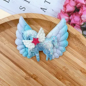 Glitter unicorn hair clip with angel wings for kids, cute side bang hair accessory.