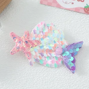 Detail de pince a cheveux sirena paillettes enfants, jolie barrette coquillage coloree pour filles.