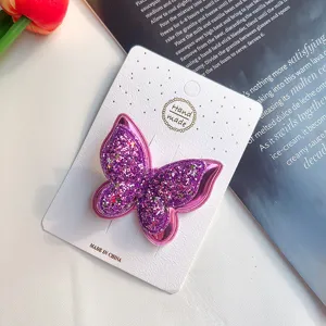 Glitzernder Schmetterling Haarklammer für Mädchen, lila doppelte Haarspange Detail.