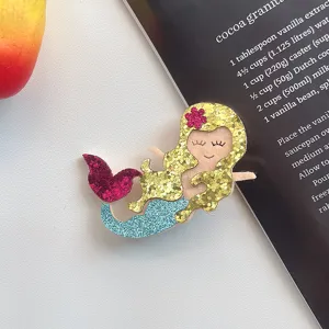Glitter cartoon mermaid hair clip detail, sparkling sequin design for kids cute hairstyles.