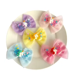 Kids mesh bow hair clips with glitter unicorn angel wings. Cute colorful side hair accessories.