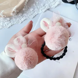 Jolis élastiques à cheveux en peluche oreilles de lapin avec pompon rose et nœud pour coiffure fille.