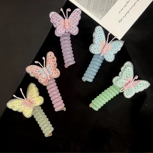 Embroidery butterfly phone wire hair tie detail showing vibrant multi-color options