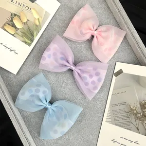 Sweet mesh polka dot bow hair clips for baby girls, cute pastel hair accessories set.